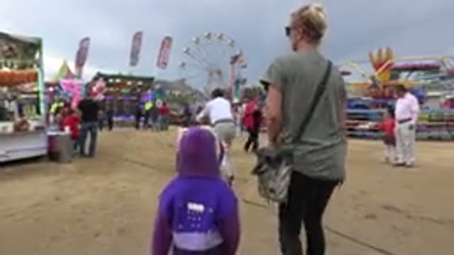 SAN JOSE DEL CABO MEXICO-2019: A Mother And A Daughter Are Walking Through A Festival
