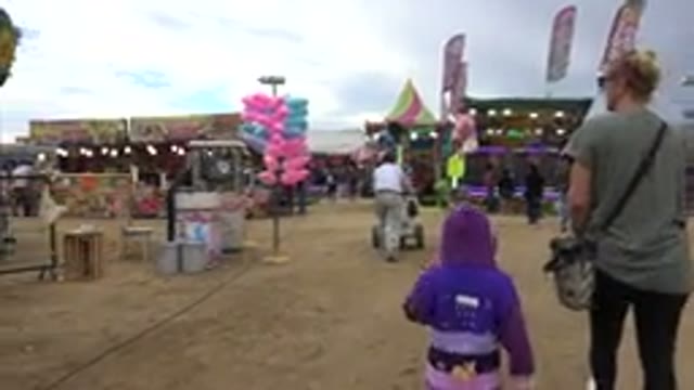 SAN JOSE DEL CABO MEXICO-2019: A Mother And Daughter Walking In An Amusement Park