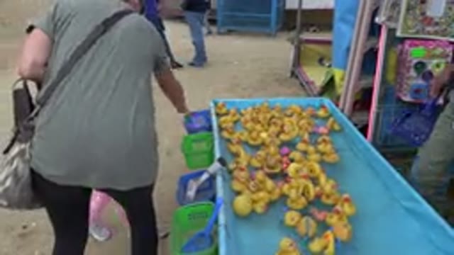 SAN JOSE DEL CABO MEXICO-2019: A Little Child Trying To Take A Gum Duck In A