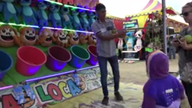 SAN JOSE DEL CABO MEXICO-2019: Carnival Arcade Bucket Toss Challenge