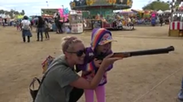 SAN JOSE DEL CABO MEXICO-2019: Child In The Amusement Park Learning To Shoot