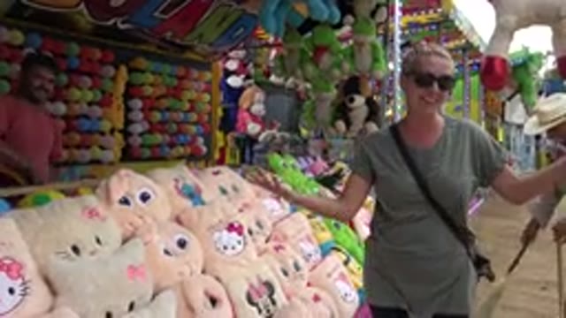 SAN JOSE DEL CABO MEXICO-2019: Mom Wins Peluche For Daughter At Fair