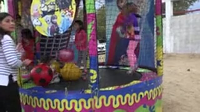 SAN JOSE DEL CABO MEXICO-2019: Children Happily Jumping On A Trampoline Full Of