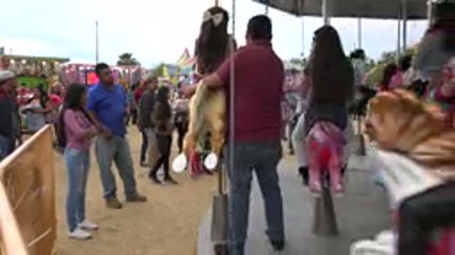 SAN JOSE DEL CABO MEXICO-2019: Families Riding The Merry-Go-Round At The Fair