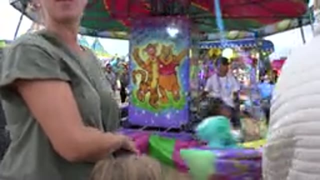 SAN JOSE DEL CABO MEXICO-2019: Lady Describing the Fun Enjoyed by Kids in Merry