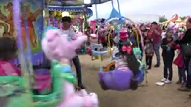 SAN JOSE DEL CABO MEXICO-2019: Children Riding A Disney Themed Carousel In A