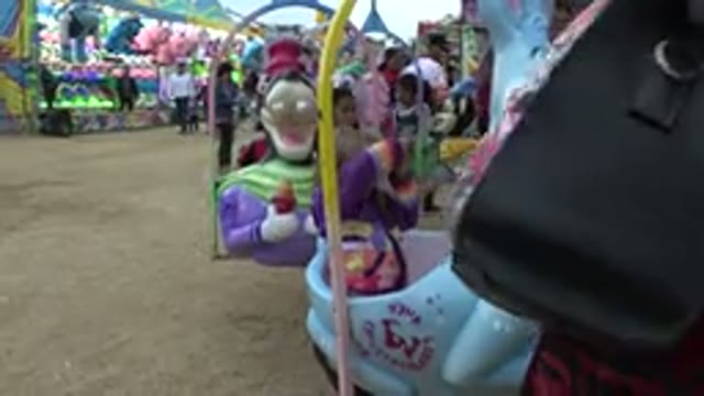 SAN JOSE DEL CABO MEXICO-2019: Children Enjoying Park Rides and Shops