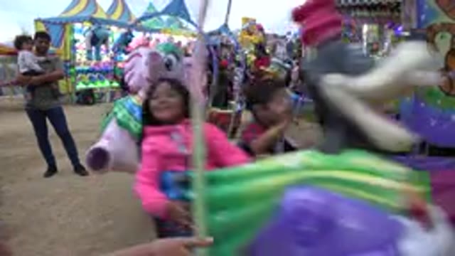 SAN JOSE DEL CABO MEXICO-2019: Children Reach Out To Give Fives As They Go