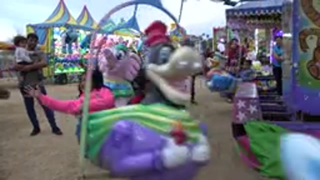 SAN JOSE DEL CABO MEXICO-2019: Small Children On Merry-Go-Round At Amusement