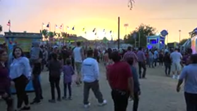 SAN JOSE DEL CABO MEXICO-2019: A Crowd Of People Visiting A Carnival At Sunset