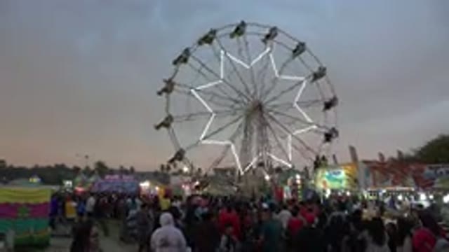 SAN JOSE DEL CABO MEXICO-2019: Ferris Wheel Spinning At The Fairground In The Night