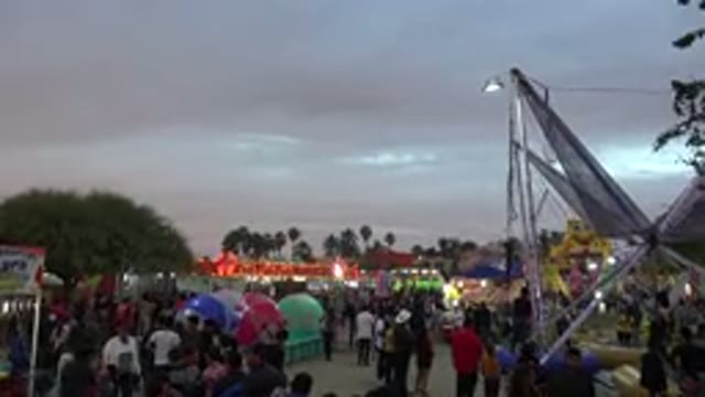 SAN JOSE DEL CABO MEXICO-2019: View Of Person Bungee Jumping At Fair On A Cloudy Day