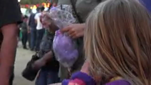 SAN JOSE DEL CABO MEXICO-2019: Blonde Girl Wiping Chocolate from Her Mouth