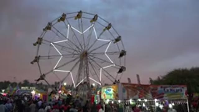 SAN JOSE DEL CABO MEXICO-2019: View Of White Illuminated Star On Ferris Wheel On