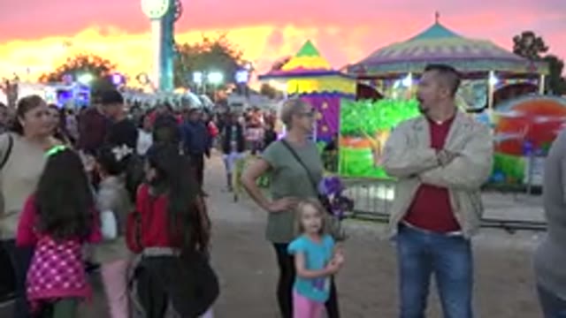 SAN JOSE DEL CABO MEXICO-2019: People Standing in Line at Amusement Park with Lights