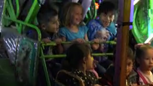 SAN JOSE DEL CABO MEXICO-2019: Many Children Enjoy A Ride On A Swinging Carnival Ride