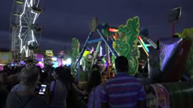 SAN JOSE DEL CABO MEXICO-2019: People Waiting In Line To Get On A Ride At A Carnival