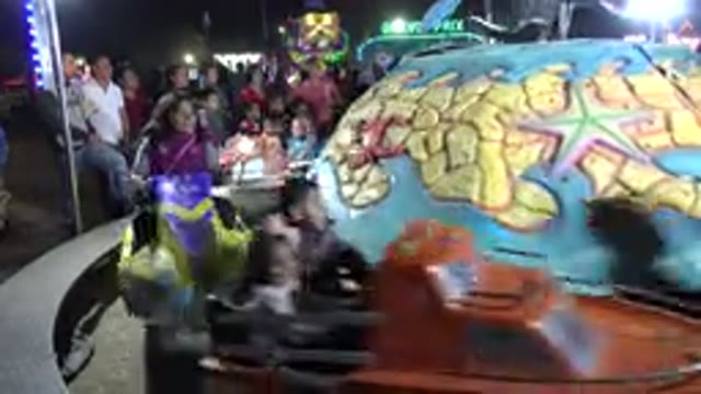 SAN JOSE DEL CABO MEXICO-2019: Children Playing In Amusement Park While Parents Watch