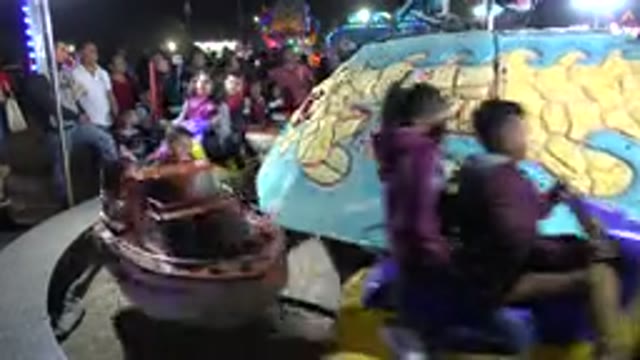 SAN JOSE DEL CABO MEXICO-2019: Children Have Fun In A Carousel With Their