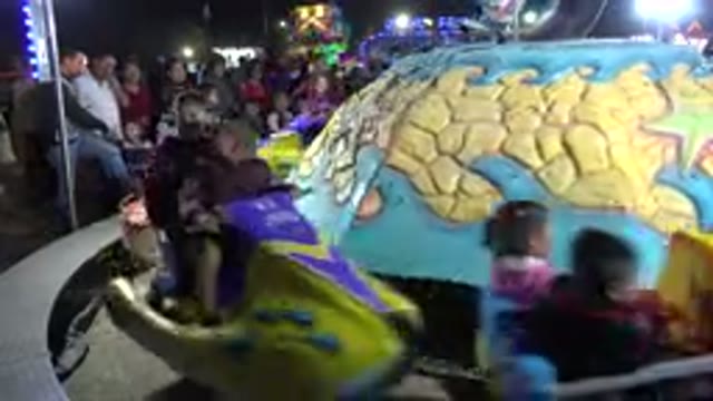 SAN JOSE DEL CABO MEXICO-2019: Kids Playing On Merry Go Round