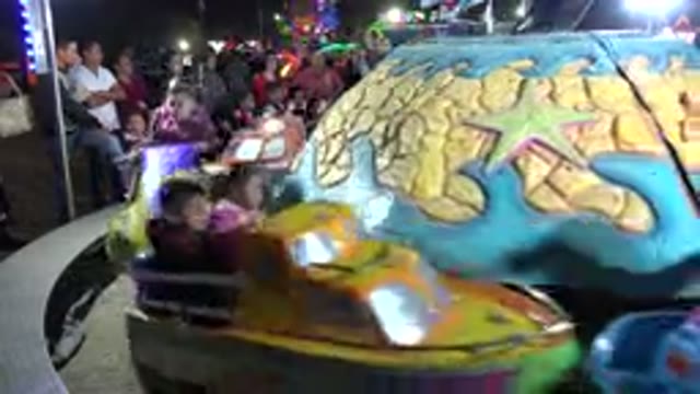 SAN JOSE DEL CABO MEXICO-2019: Kids Ride In Cars Shaped Like Boats And Jet Skis