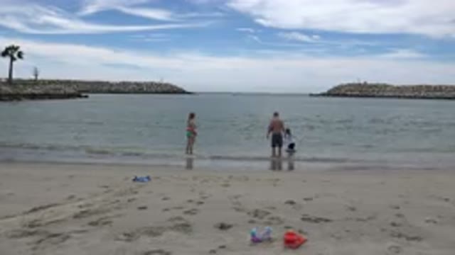 SAN JOSE DEL CABO MEXICO-2019: A Boy And Three Children Playing At The Beach