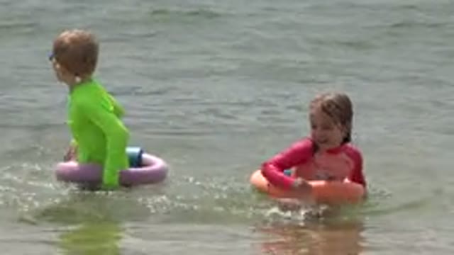 SAN JOSE DEL CABO MEXICO-2019: A Little Boy And A Little Girl Playing In The Water