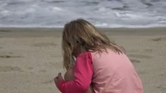 SAN JOSE DEL CABO MEXICO-2019: Small Child Playing With Sand Looking At The Ocean