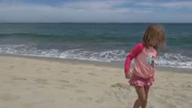SAN JOSE DEL CABO MEXICO-2019: Small Child Walking On A Beautiful Beach In A