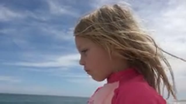 SAN JOSE DEL CABO MEXICO-2019: Pink Dress Brown Hair Girl Child Speaking