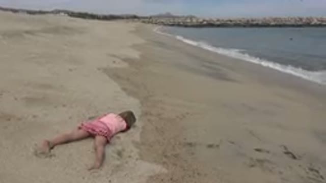 SAN JOSE DEL CABO MEXICO-2019: A Young Girl Plays On A Beach During Daytime