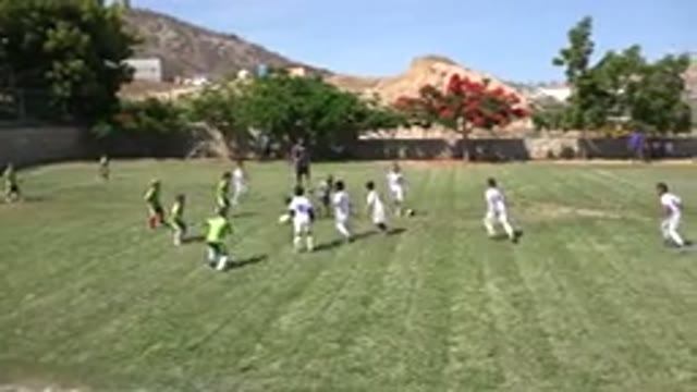 SAN JOSE DEL CABO MEXICO-2019: Kids Playing Football On Sunny Day