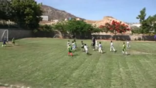 SAN JOSE DEL CABO MEXICO-2019: Kids Playing Soccer Game On A Bright Sunny Day