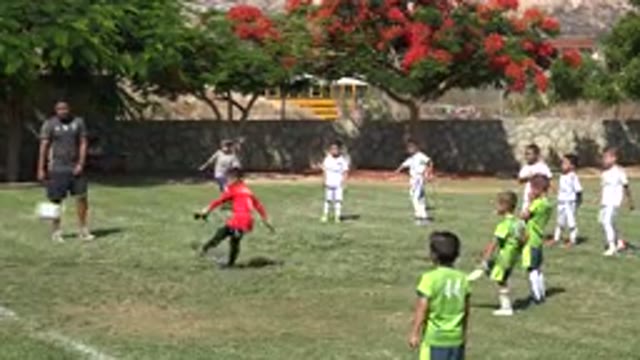 SAN JOSE DEL CABO MEXICO-2019: Young Male Children Playing Soccer At School On A