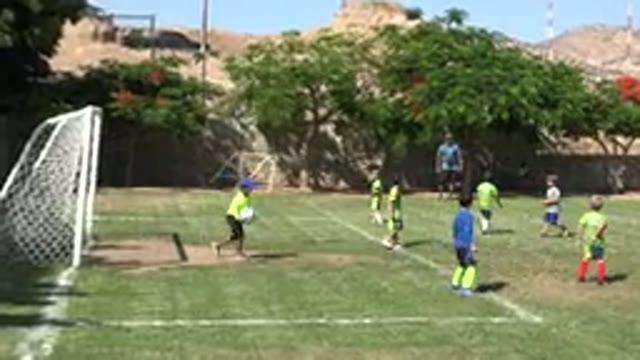 SAN JOSE DEL CABO MEXICO-2019: Soccer Goalie Punts The Ball Towards The Enemy