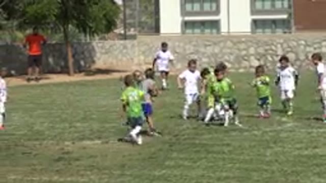 SAN JOSE DEL CABO MEXICO-2019: Child Stumbles As He Attempts To Kick Ball During