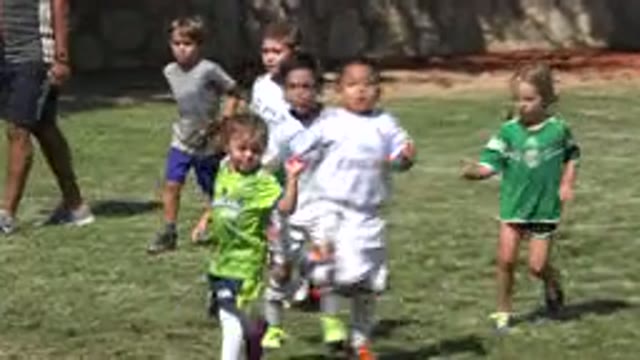 SAN JOSE DEL CABO MEXICO-2019: Children Having Fun Running And Playing Soccer In