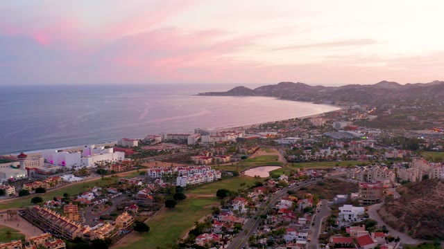 SAN JOSE DEL CABO MEXICO-2021: Coastal Town at Dusk with Pink Sky