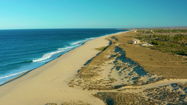 TODOS SANTOS BCS MEXICO-2021: Waves Rolling Onto a Wide Sandy Shore
