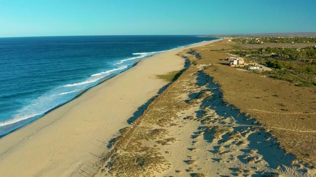 TODOS SANTOS BCS MEXICO-2021: Vehicle Moving Along Coastal Dunes