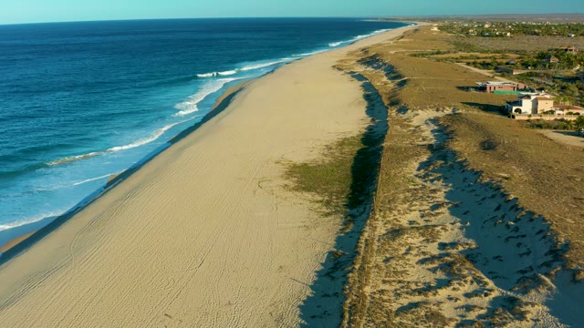 TODOS SANTOS BCS MEXICO-2021: Gentle Ocean Waves Rolling Onto Sandy Shore