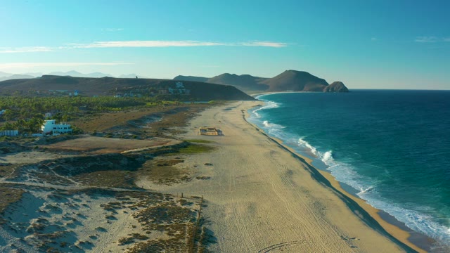 TODOS SANTOS BCS MEXICO-2021: Sandy Beach and Ocean Waves with Distant Mountains