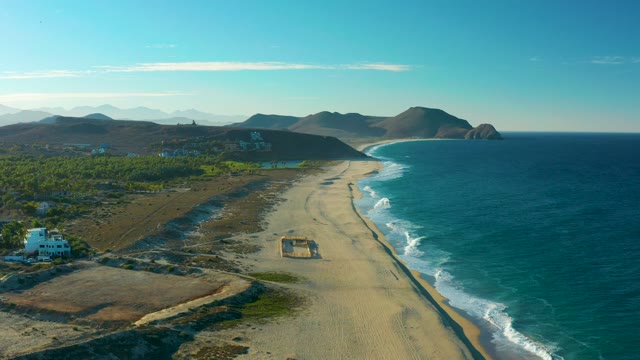 TODOS SANTOS BCS MEXICO-2021: Coastal Beach with White Building and Ocean Waves
