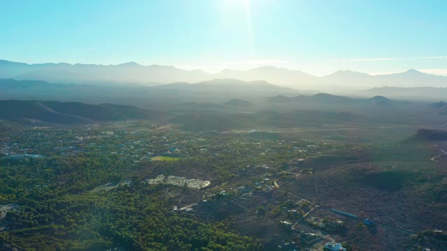 TODOS SANTOS BCS MEXICO-2021: Aerial Pan of Mountain Valley Town