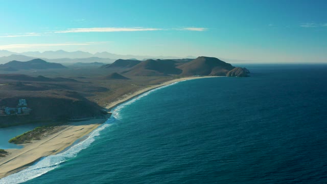 TODOS SANTOS BCS MEXICO-2021: Gentle Ocean Waves Along Sandy Shoreline