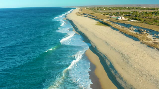 TODOS SANTOS BCS MEXICO-2021: Gentle Ocean Waves Rolling Onto Sandy Shore