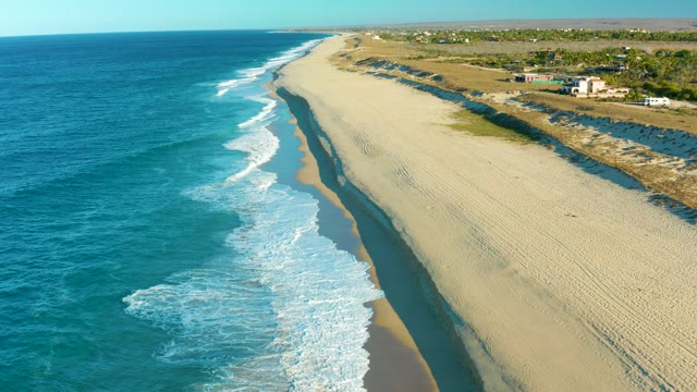 TODOS SANTOS BCS MEXICO-2021: Ocean Waves Rolling Onto Sandy Beach