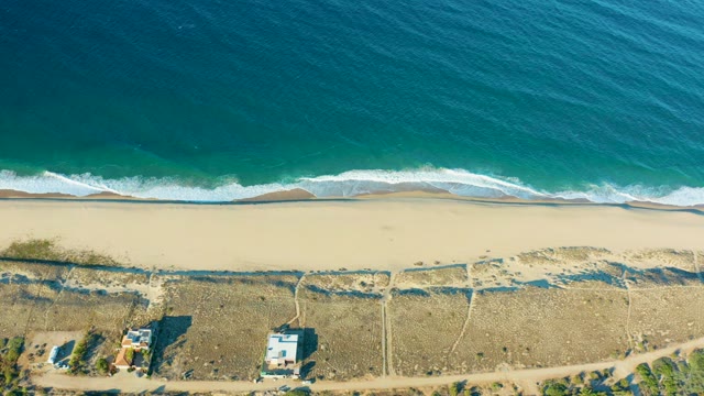TODOS SANTOS BCS MEXICO-2021: Waves Rolling Onto Sandy Shore From Above
