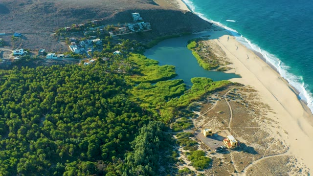 TODOS SANTOS BCS MEXICO-2021: Ocean Waves Moving Along Sandy Beach and Lagoon