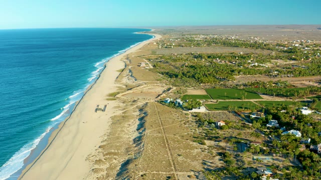 TODOS SANTOS BCS MEXICO-2021: Vehicle Moving Along Sandy Beach